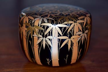 Vintage Japanese black lacquer tea caddy with auspicious gold makie bamboo forest design, used in the Japanese Tea Ceremony